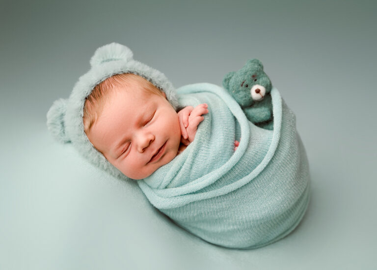 Newborn photos with two-week-old Teddy